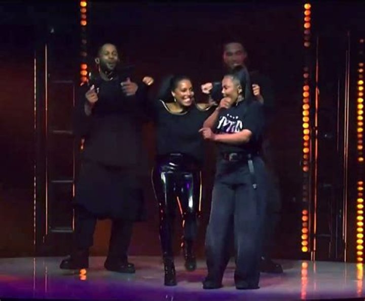 Janet Jackson moves hands over backup dancer's crotch at concert